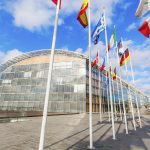 Luxembourg City, Luxembourg - November 04, 2015: European Investment Bank -EIB- and European flags in the European District -Kirchberg Plateau-. The EIB is a publicly owned international financial institution and its shareholders are the EU member states